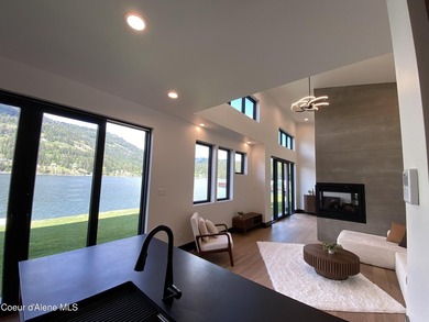 New Lakefront Quality Custom built home sitting at Lake Level on - photo 6