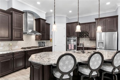 Experience luxurious waterfront living in this impeccably - photo 4