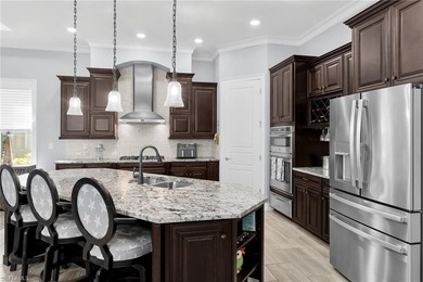 Experience luxurious waterfront living in this impeccably - photo 6