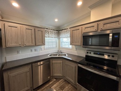2 MONTHS FREE LOT RENT!! Fresh price on this brand-new Nobility - photo 12