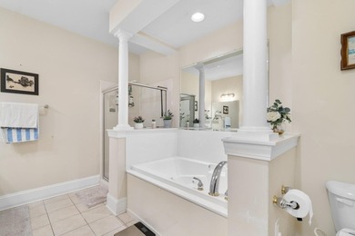 Sunlight pours into this bright, open 3-bedroom, 2-bath end-unit - photo 17