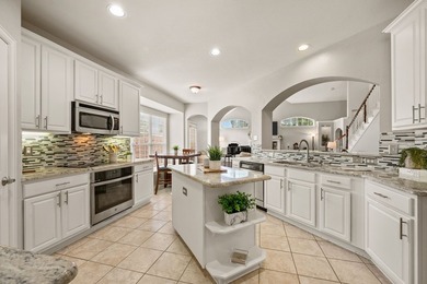 Welcome to this beautifully maintained garden home nestled in a - photo 17