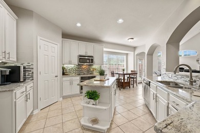 Welcome to this beautifully maintained garden home nestled in a - photo 18
