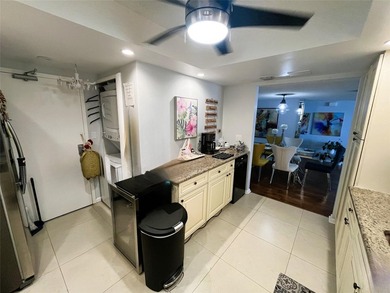 Updated condo with great NE ocean views. Wood tile floors. Split - photo 11