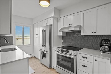 Experience effortless waterfront living at sought after - photo 13