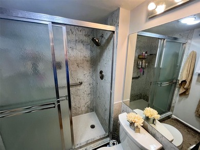 Updated condo with great NE ocean views. Wood tile floors. Split - photo 45