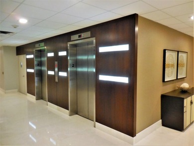 Updated condo with great NE ocean views. Wood tile floors. Split - photo 50