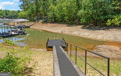 Nestled along the shores of Lake Hartwell, this charming cottage - photo 7