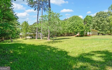 Nestled along the shores of Lake Hartwell, this charming cottage - photo 8