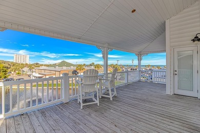 This LAKE FRONT 5 bedroom 3.5 bath raised beach house with - photo 18
