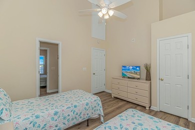 This LAKE FRONT 5 bedroom 3.5 bath raised beach house with - photo 25