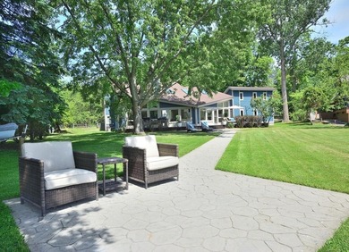 Rare Okauchee Lake home with 73' frontage on over 3/4 acre! Flat - photo 2