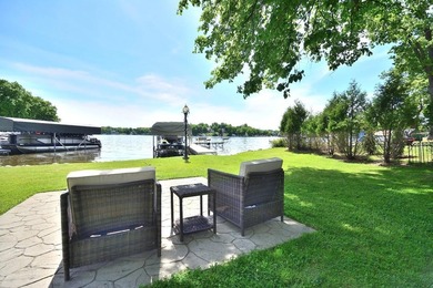 Rare Okauchee Lake home with 73' frontage on over 3/4 acre! Flat - photo 3