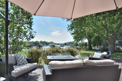 Rare Okauchee Lake home with 73' frontage on over 3/4 acre! Flat - photo 4