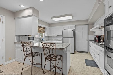 Exceptional value in PRIME LOCATION! This updated brick home on - photo 11