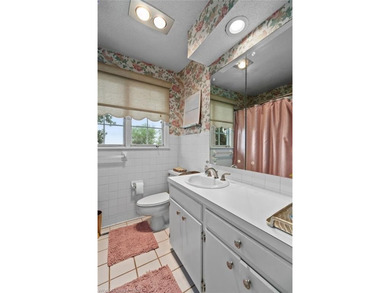 Exceptional value in PRIME LOCATION! This updated brick home on - photo 19