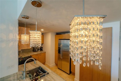 Exclusive 2 bedroom + den, 2 bathroom condo featuring