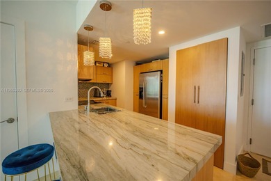 Exclusive 2 bedroom + den, 2 bathroom condo featuring