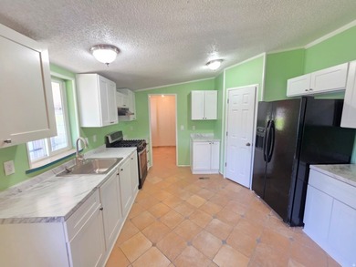Wow! What a huge Mobile Home Features 5 Bedrooms 2 bathrooms. In - photo 9