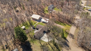 Nestled in the woods just minutes north of Brainerd/Baxter, this - photo 3
