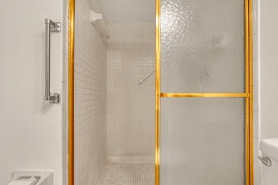 Step into this inviting two-bedroom, two-bathroom condo, where - photo 27