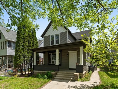 This beautifully renovated 5-bedroom, 2-bath home has been - photo 2
