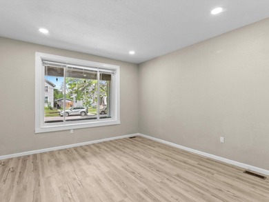 This beautifully renovated 5-bedroom, 2-bath home has been - photo 7