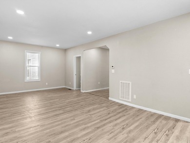This beautifully renovated 5-bedroom, 2-bath home has been - photo 8
