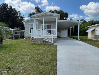 This brand-new 2025 manufactured home offers modern living in a - photo 1