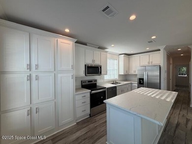 This brand-new 2025 manufactured home offers modern living in a - photo 4