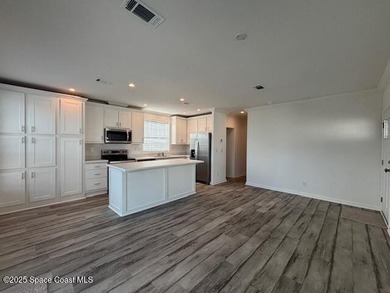 This brand-new 2025 manufactured home offers modern living in a - photo 8