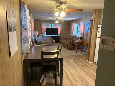 This beautifully kept home features 2 bedrooms, 1.5 bathrooms - photo 5
