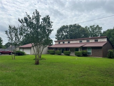 Welcome to your lakeside getaway! This 3-bedroom, 2-bath home - Lake Home For Sale in Pittsburg, Texas