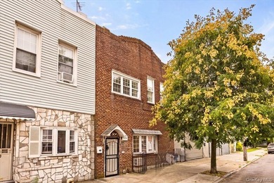 Welcome to this solid brick two-family home in the popular - photo 1