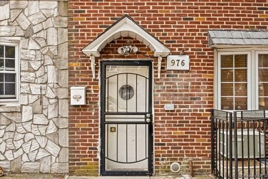 Welcome to this solid brick two-family home in the popular - photo 3