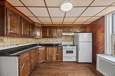 Welcome to this solid brick two-family home in the popular - photo 7