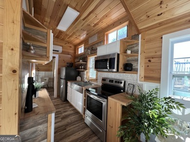 This custom *magnolia* titled Park Model RV brings tiny living - photo 12