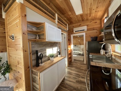This custom *magnolia* titled Park Model RV brings tiny living - photo 13