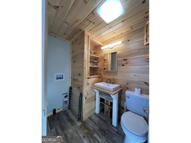 This custom *magnolia* titled Park Model RV brings tiny living - photo 14