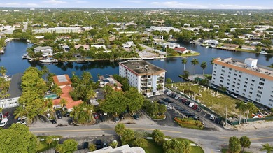 Wake up to stunning water views from every room! Located in - photo 27