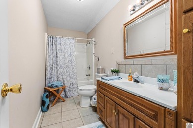 Located on the golf course in Drake Creek, this 4-bedroom, 2 - photo 28
