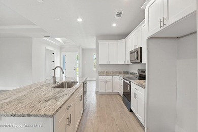 10K CLOSING COST CREDIT!! Welcome to your dream home! This - photo 6