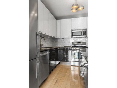 Don't miss this stunning, extra-wide 1-bedroom, 1.5-bath condo