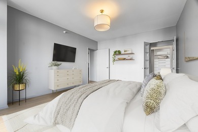 Don't miss this stunning, extra-wide 1-bedroom, 1.5-bath condo