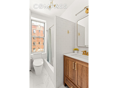 Welcome to 37-51 84th Street #21, a spacious junior-four - photo 6