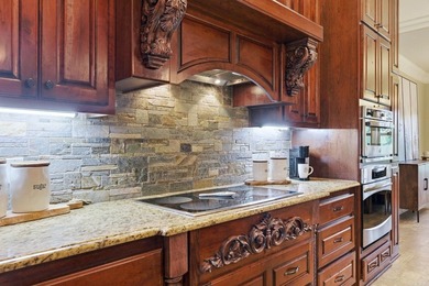Meticulously maintained, custom-built masterpiece nestled on - photo 12