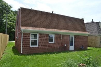 Recently remodeled and move-in ready! This charming brick - photo 25