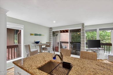 Tucked away in Lakeside Villa Condominiums, this charming - photo 15