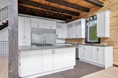 Experience the perfect blend of rustic charm and luxury in this - photo 17