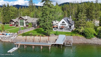 Where mountain views meet riverfront living, this exceptional - photo 1